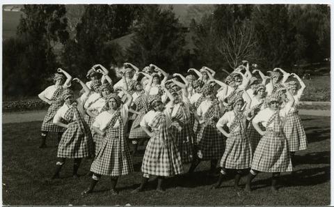[Girls, dressed in 'Scottish costume', performing 'Highland Fling' at the annual Athletic Carnival]