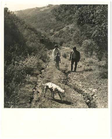 [Harold Miossi and two others on hiking path]