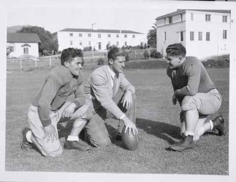 Football Coach Howie O'Daniels with Two Members of the Team [copy negative]