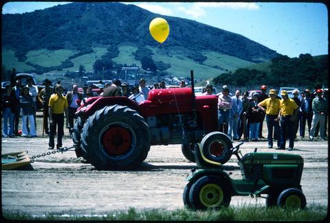 [Tractor pull competitor with sled]
