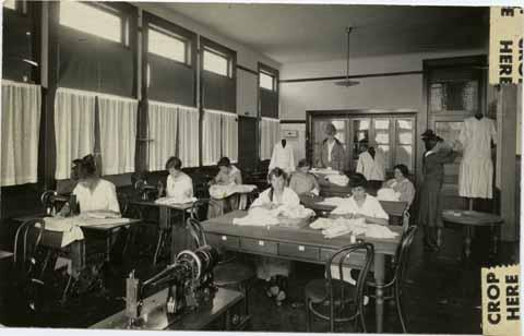 Students sewing using machines and by hand
