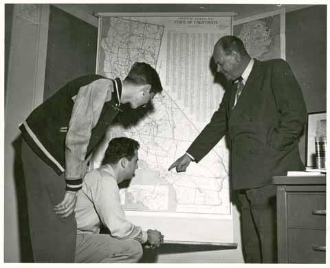 President McPhee Pointing to the Voorhis Unit on a Map of California