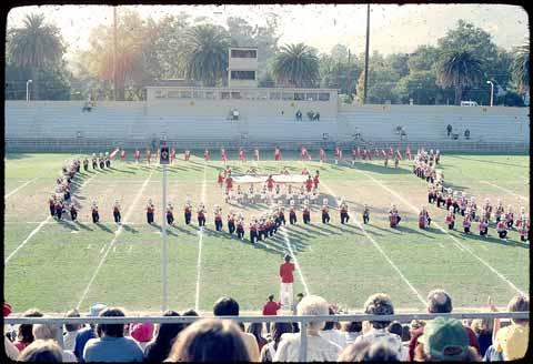 [Marching band performance, Homecoming parade, 1975]