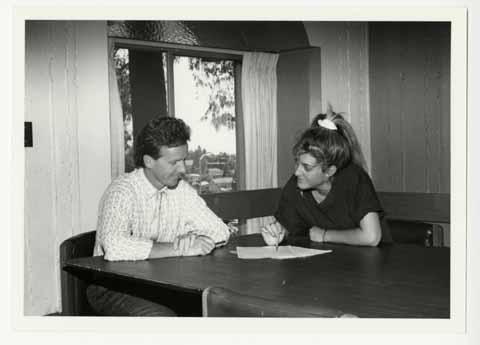 [Two students at Sierra Madre conference table]