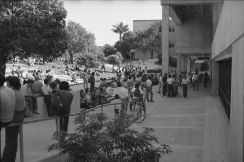 [Students in the open space in front of the Kennedy Library entrance]