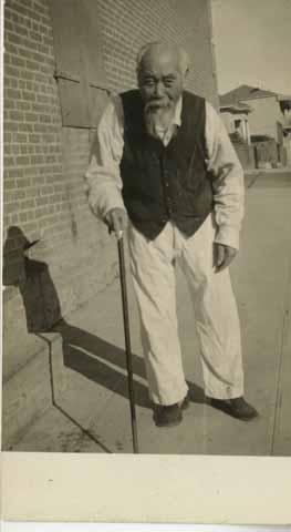 [Ah Louis standing near Ah Louis Store, circa 1933-1936]